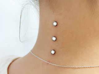 Microdermal piercing, cercei, piercing foto 6