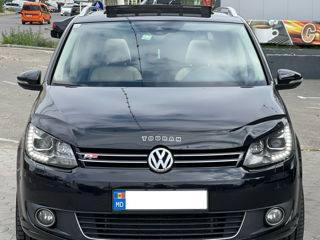 Volkswagen Touran foto 1