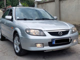 Mazda 323 foto 1