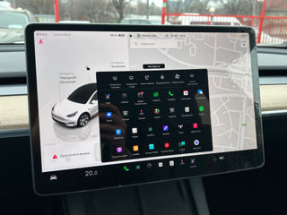 Tesla Model Y foto 11