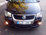 Volkswagen Touran foto 1