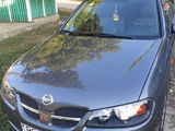 Nissan Almera foto 1