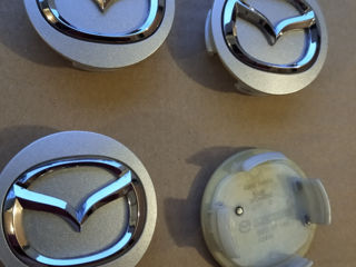 Заглушки на диски KIA, Mazda foto 1