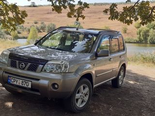 Nissan X-Trail foto 1