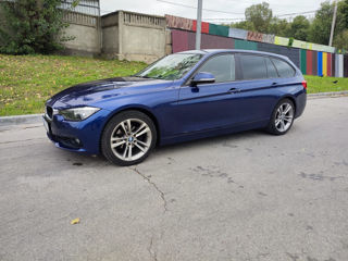 BMW 3 Series Touring foto 2