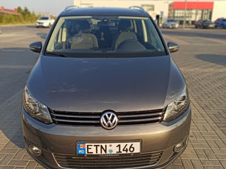 Volkswagen Touran foto 1