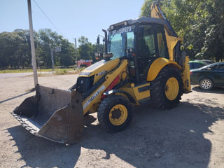 vând sauskimb  buldoexcavator şi basculantă foto 3