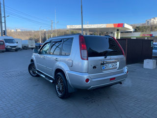 Nissan X-Trail foto 2