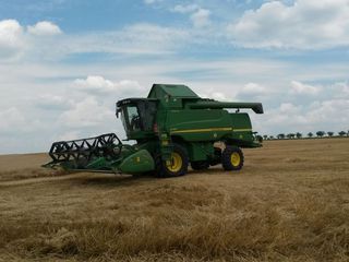 Combine John Deere W550  .Hillmasster foto 2