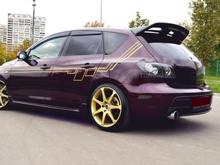 Mazda 3 foto 1