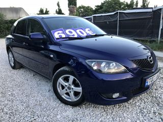 Mazda 3 foto 1