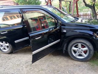 Nissan X-Trail foto 2