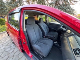 Nissan Tiida фото 7