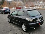 Peugeot 206 foto 1