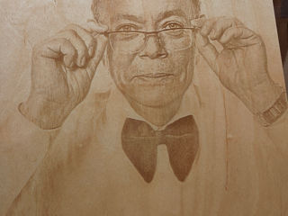 Portret gravat pe lemn foto 1