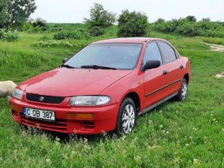Mazda 323 foto 0