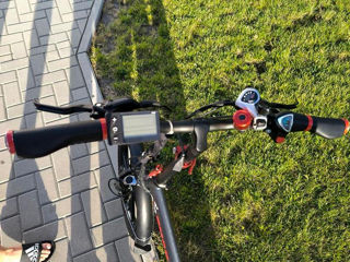 Bicicletă electrică foto 4