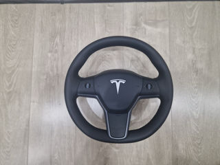 Tesla model 3/Y foto 2