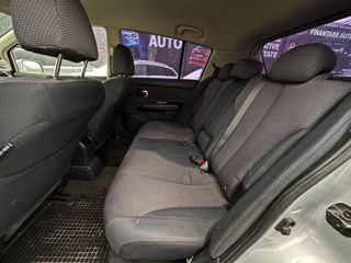 Nissan Tiida фото 8