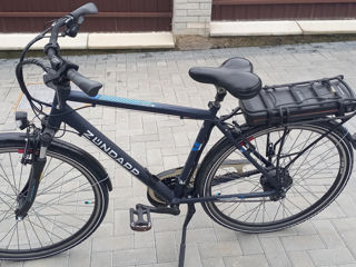 Bicicletă electrică foto 2