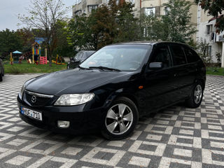 Mazda 323 foto 1