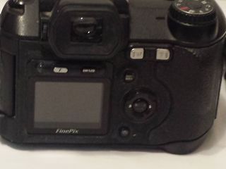 Фотоаппарат цифровой компактный Fujifilm FinePix S5500 и фото кассеты коробочки для пленок foto 6