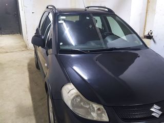 Suzuki SX4 foto 1