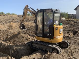 Excavator buldoexcavator bobcat foto 4