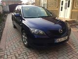 Mazda 3 foto 1