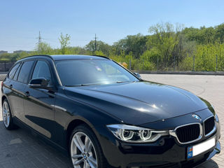 BMW 3 Series Touring foto 1