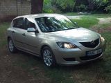 Mazda 3 foto 1