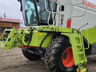 Terra Class vinde combină Claas Lexion 670 4X4 Montana din 2014 foto 12