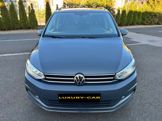 Volkswagen Touran foto 2