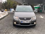 Volkswagen Touran foto 1