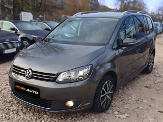 Volkswagen Touran foto 1