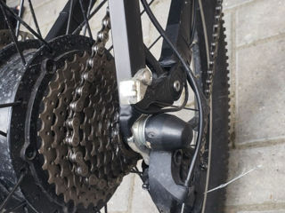 Bicicletă electrică foto 1