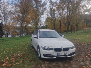 BMW 3 Series Touring foto 4