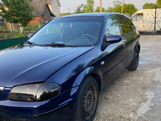 Mazda 323 фото 1
