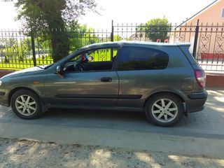 Nissan Almera foto 1