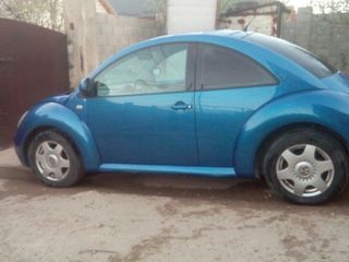 Volkswagen New Beetle foto 1