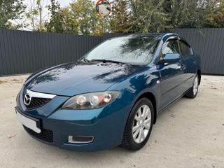 Mazda 3 foto 1