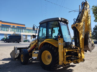 vând sauskimb  buldoexcavator şi basculantă foto 5