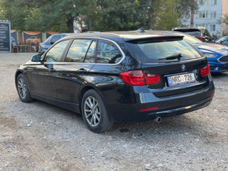 BMW 3 Series Touring foto 4