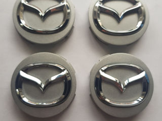 Колпачки заглушки Mazda foto 1