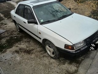 Mazda 323 1991г. в foto 2