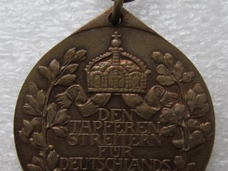 Медали и 2 кружки ГДР foto 2