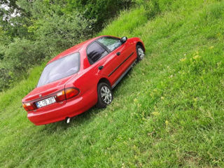Mazda 323 foto 2