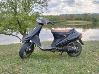 Suzuki AG100 foto 0
