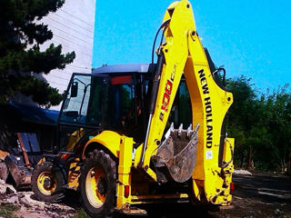 Vând Buldo-Excavator New Holland B100C (a. 2014) foto 1