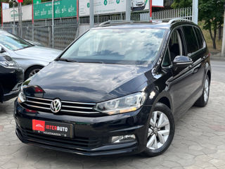 Volkswagen Touran foto 1